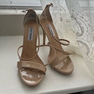 Nude Steve Madden strapping heels